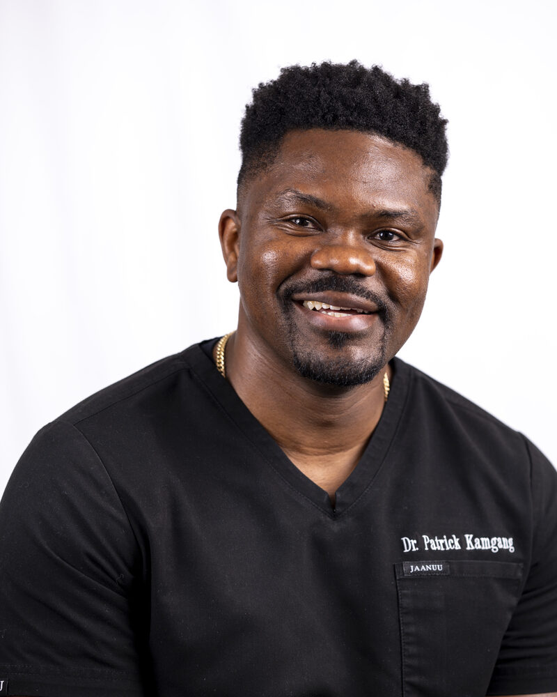 Portrait of Dr. Patrick Kamgang, DDS, implant dentist at Marshall H. Brown, DDS in Fort Worth